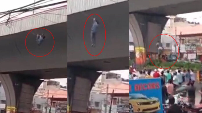 Hyderabad | మద్యం మత్తులో వైర్​ పట్టుకొని వేలాడిన వ్యక్తి