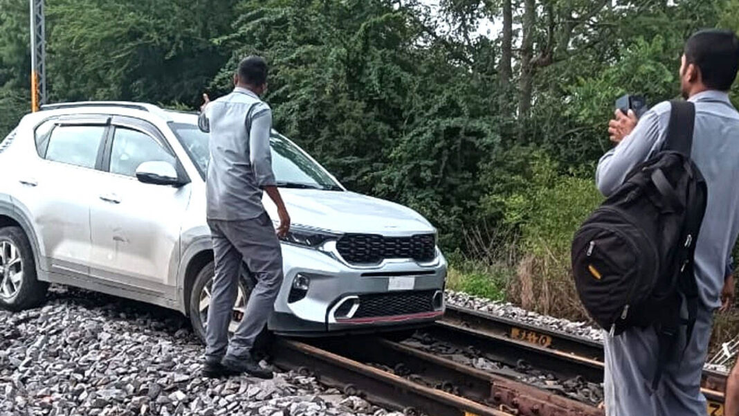 Car on Railway Track