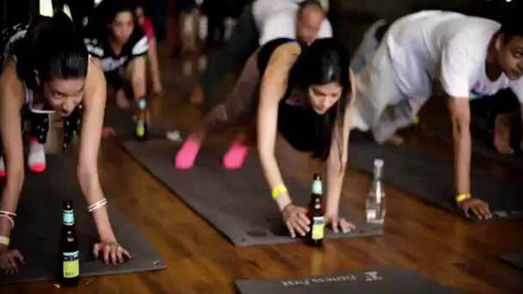 YOGA DAY | ఏమిటీ ఈ బీర్​​ యోగా.. నెటిజన్ల విమ‌ర్శ‌లు